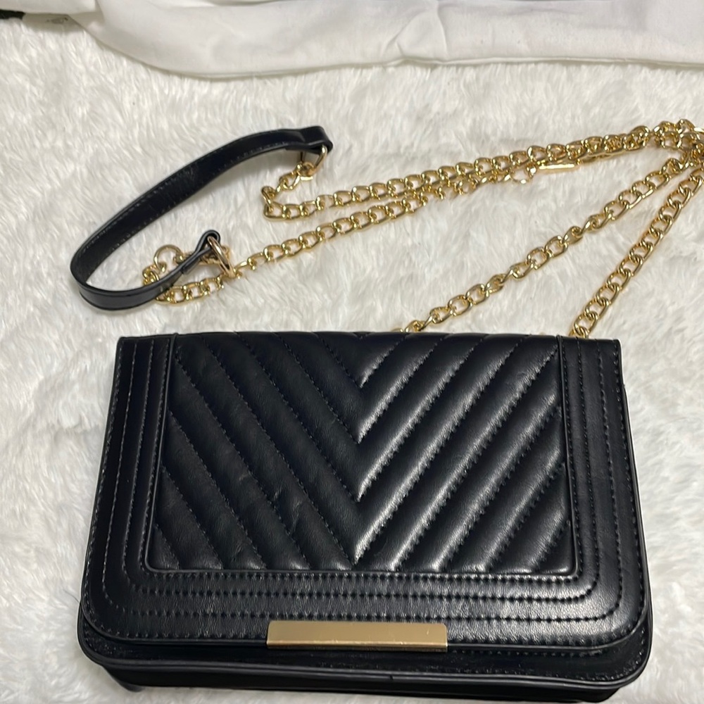 Medium size black cross body bag